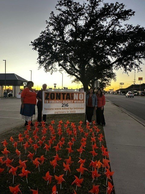 216 orange pinwheels for 16 Days of Activism